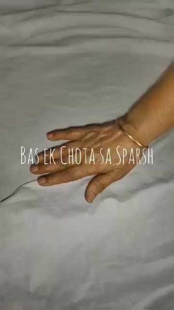 A caring hand resting beside an elder as part of a companionship film